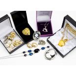 A large collection of costume jewellery, including silver gem set rings, a collection of novelty and