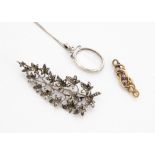 A rock crystal silver set pendant, an amethyst and 9ct gold knot twist bar pendant, and a silver