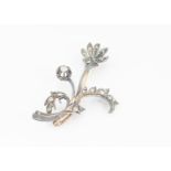 A 19th Century French diamond set floral brooch, of spray design, the rose cut silver set diamonds