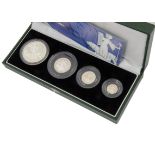A Royal Mint UK Britannia Silver Proof Collection four coin set, dated 2001, in green case with