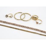 A collection of gold, including gentleman's signet ring, gold necklace and bracelet, earrings and