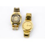 Two Seiko automatic gilt gentlemens wristwatches, one a Seiko 5 with day and date, the other