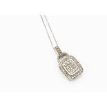 A hot diamond 9ct white gold pendant and chain, the diamond encrusted drop and bale marked 9K and