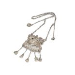 A late 19th century silver plated chatelain, with roman inspired clasp supporting five chains with a