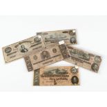 Five 19th century US bank notes, each marked for the Confederate States of America, earliest being