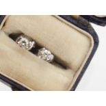 A pair of diamond brilliant cut stud earrings, in white 18ct gold, boxed