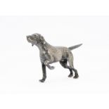 A 1970s silver model of a gun dog, naturalistically modelled on three legs as a pointer, London