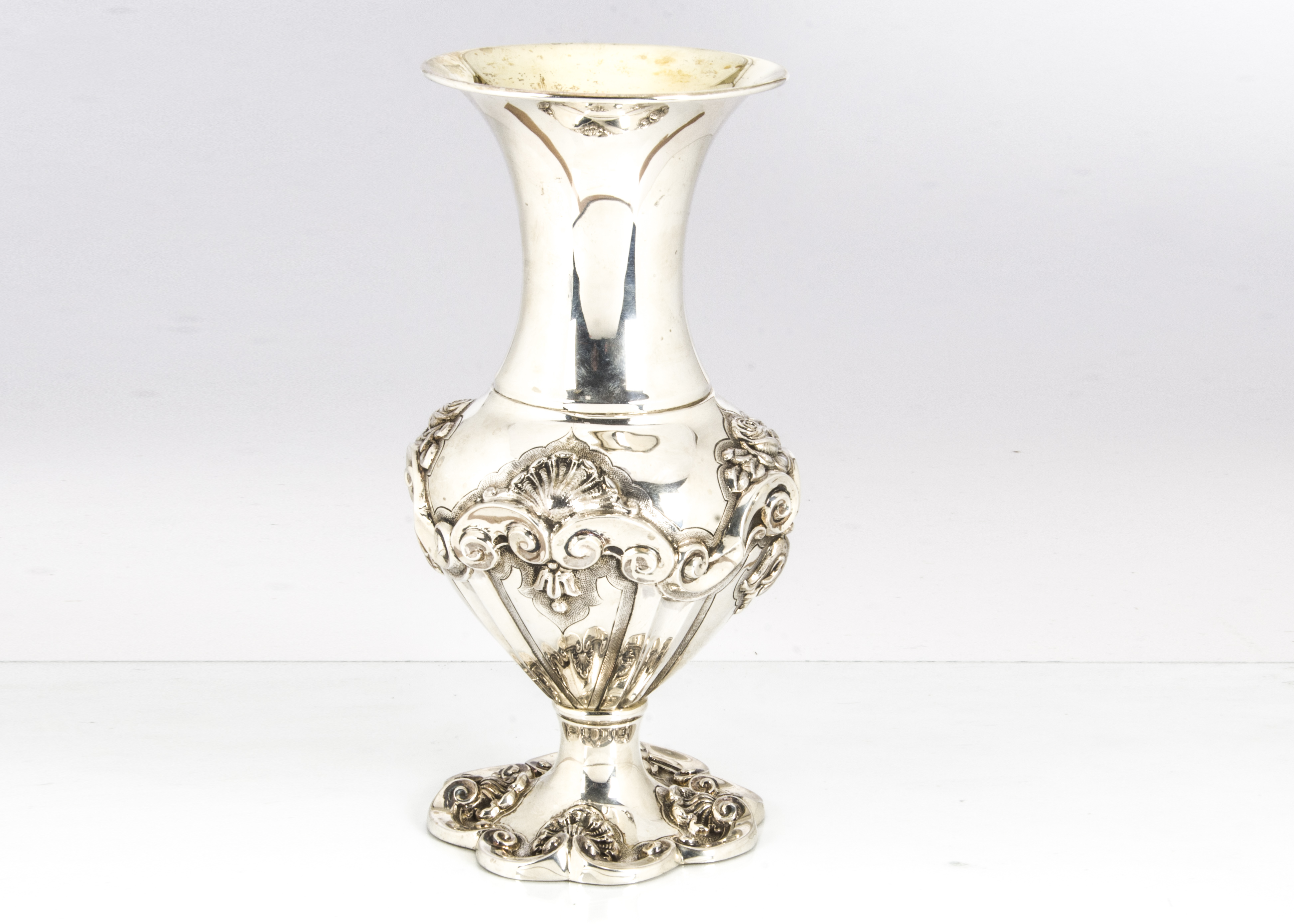 A c1970s continental silver vase, possibly Italian, marked 0.925, with raised flower and shell