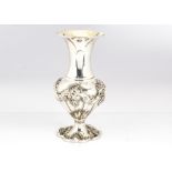 A c1970s continental silver vase, possibly Italian, marked 0.925, with raised flower and shell