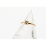 A diamond solitaire ring, the brilliant cut in claw setting on a yellow gold shank, ring size C, 1.