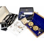 A part cased George V silver manicure set, lacks scissors, together with a 9ct gold wedding band,