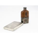 An Art Deco period large silver cigarette case, 8.2 ozt, together with a silver plated, glass and