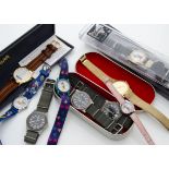 A group of wristwatches, including three CWC military style quartz examples, a manual wind Favre