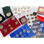 A collection of British coins, a box file full of modern coins, including three £5 commemorative