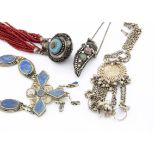 A collection of North African white metal jewellery, together with a large quantity of Middle