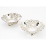 A pair of Victorian silver bon bon dishes by GT & Co, having raised and pierced decoration,