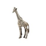A modern silver sculpture of a giraffe by Patrick Mavros, naturalistically modelled in standing