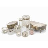 Two George V silver trinket boxes and eight cut glass and silver dressing tables, one demi-lune with