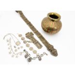 A collection of Middle Eastern and Egyptian jewels, including a silver and silver gilt niello work