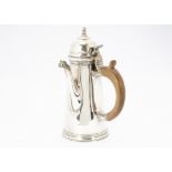 An Edwardian Britannia silver café au lait pot, probably from Charles Stuart Harris, London 1908, in