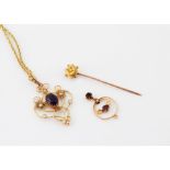 An Edwardian 9ct gold amethyst Art Nouveau pendant and chain, together with a similar pendant and