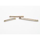 A 15ct gold and platinum topped tie pin, 2.9g, together with a 9ct gold tie pin and a gilt metal