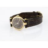 A c1980s Must de Cartier silver gilt quartz lady's wristwatch, 19mm circular case, brown dial with