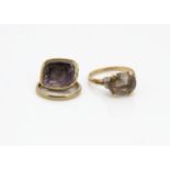 A 9ct gold wedding band, ring size K, a citrine 18k marked dress ring, ring sie P and an amethyst