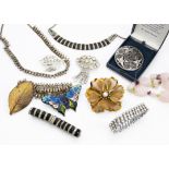 A collction of costume jewellery, including an Art Deco DoSo marked necklace and matching