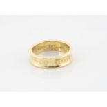 An 18ct gold Tiffany & Co ring, hallmarked to inner shank, ring size S, 8.8g, in cloth bag