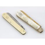 Two Victorian pocket knives, one with mop handles having a silver gilt blade and a steel blade,