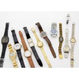 A collection of ladies wristwatches, including a gold plated and black Chanel example, a gold plated