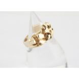 A 9ct gold textured dress ring, ring size S, 10g