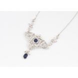 A contemporary sapphire and diamond necklace, the ornate openwork floral setting in the Art