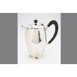 A 1960s silver hot water pot by Elkington & Co, Birmingham 1962, Art Deco style with applied black