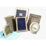 A small square modern silver photograph frame from Tiffany & Co, 10cm, in pouch, together with