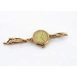 A 1930s Rolex 9ct gold lady's wristwatch, 19mm circular case, Arabic numerals to dial, appears to