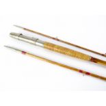 Fishing, a H.L Leonard three piece cane fishing rod, the 10 1/2 ft rod engraved W.M & Son N'York