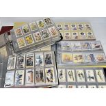 Cigarette Cards, five albums containing various sets, part sets and odds, from manufacturers,