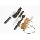 Three various knives, to include an Explora Kit knife and sheath, a German Soldier's side knife,