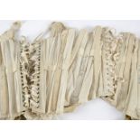 A number of corsets, including two white cotton boned corsets, stamped Dickens & Jones Ltd, The