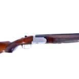 A Lincoln Over/Under 12 bore shotgun, serial 26303, complete with fitted leather bound carry case,