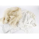 A large collection of white cotton petticoats, skirts and blouses, mainly circa 1900, one 1860s