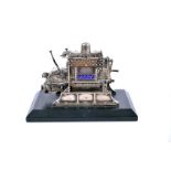 Meadows, a fine hallmarked silver presentation desk piece, modelled as a marine engine and gear box,
