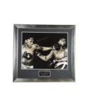 Ali Vs Fazier, a signed blown up photograph of Frazier hitting Ali, with the title 'Three