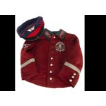 A Kosmos Sixta Uniform jacket, having bullion stitched name and design, together with a peak cap,