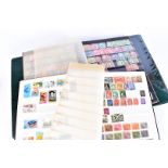 A collection of stamps and postcards, with four albums of Royal Mail PHQ postcards, other loose