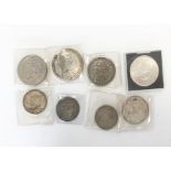 A collection of coins, including George V florins and six pences, a Maria Theresa thaler, an 1889 US