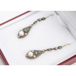 A pair of Edwardian style emerald and pearl drop earrings, the oval drops set with bouton pearls,