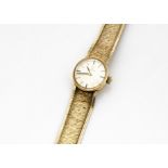 A c1970s Omega 9ct gold lady~s wristwatch, circular case with integrated 9ct gold mesh strap, 19.3g,